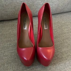 Steve Madden. About 4 1/2 - 5 inch heel.